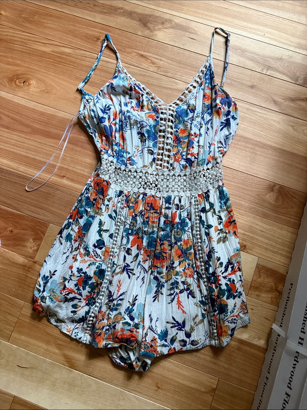 Angie White Floral Crochet Trim Romper with Blue & Orange Print